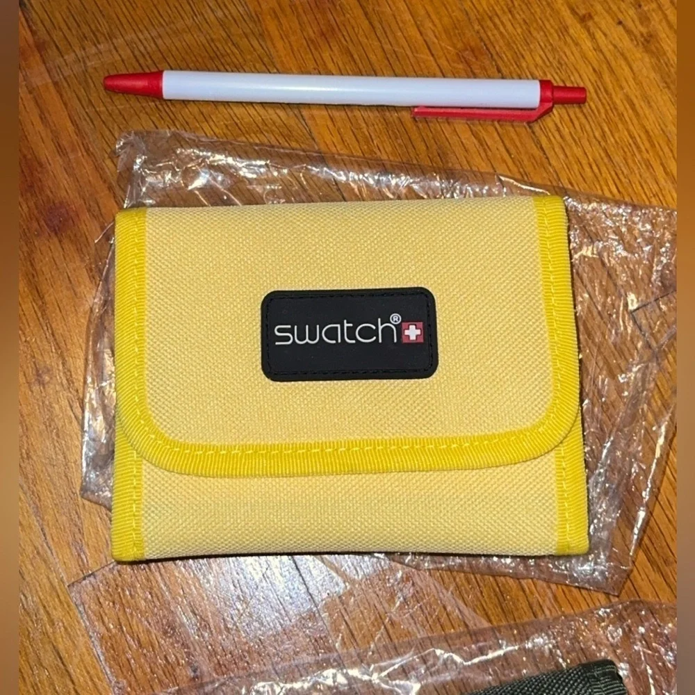 NWT Swatch brand wallet/billfold coin purse available in green or yellow unisex